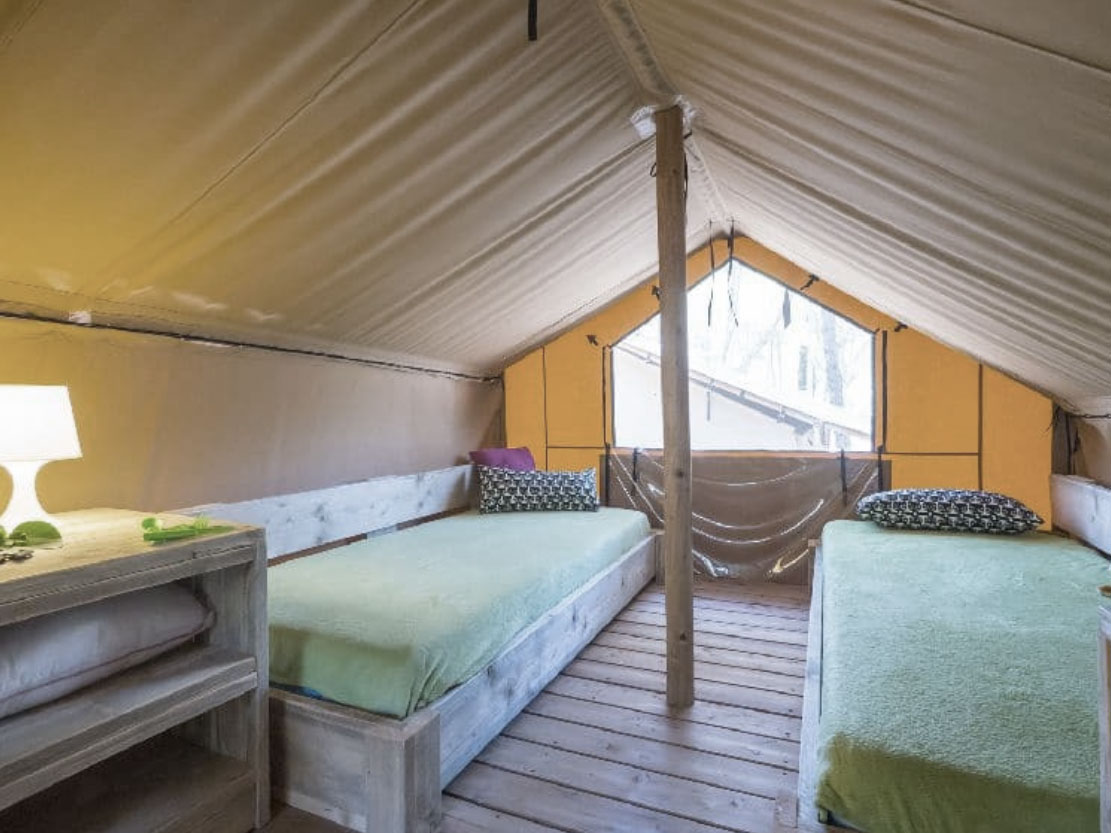 grand safari tent bedroom